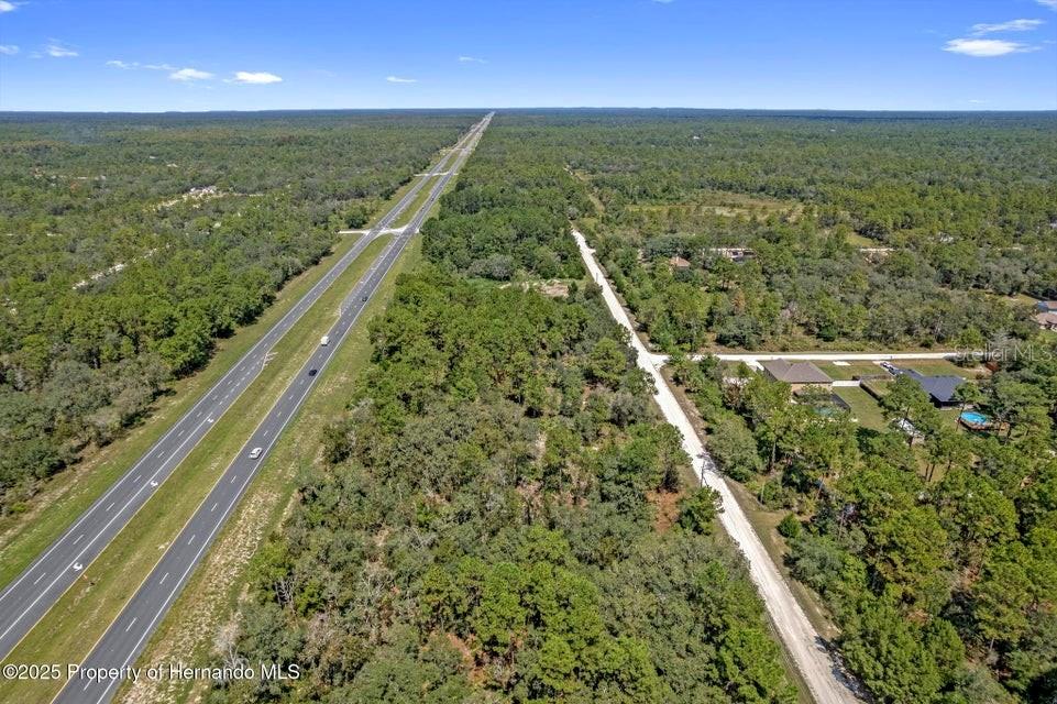 18193 Commercial Way Weeki Wachee, FL 34614 - Photo 5 of 6 a view of a balcony with an outdoor space