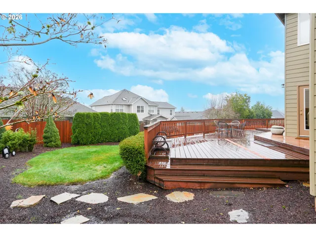 a view of swimming pool with outdoor seating and city view