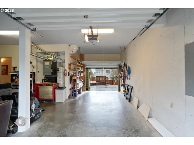 a view of a livingroom with furniture and a ceiling fan
