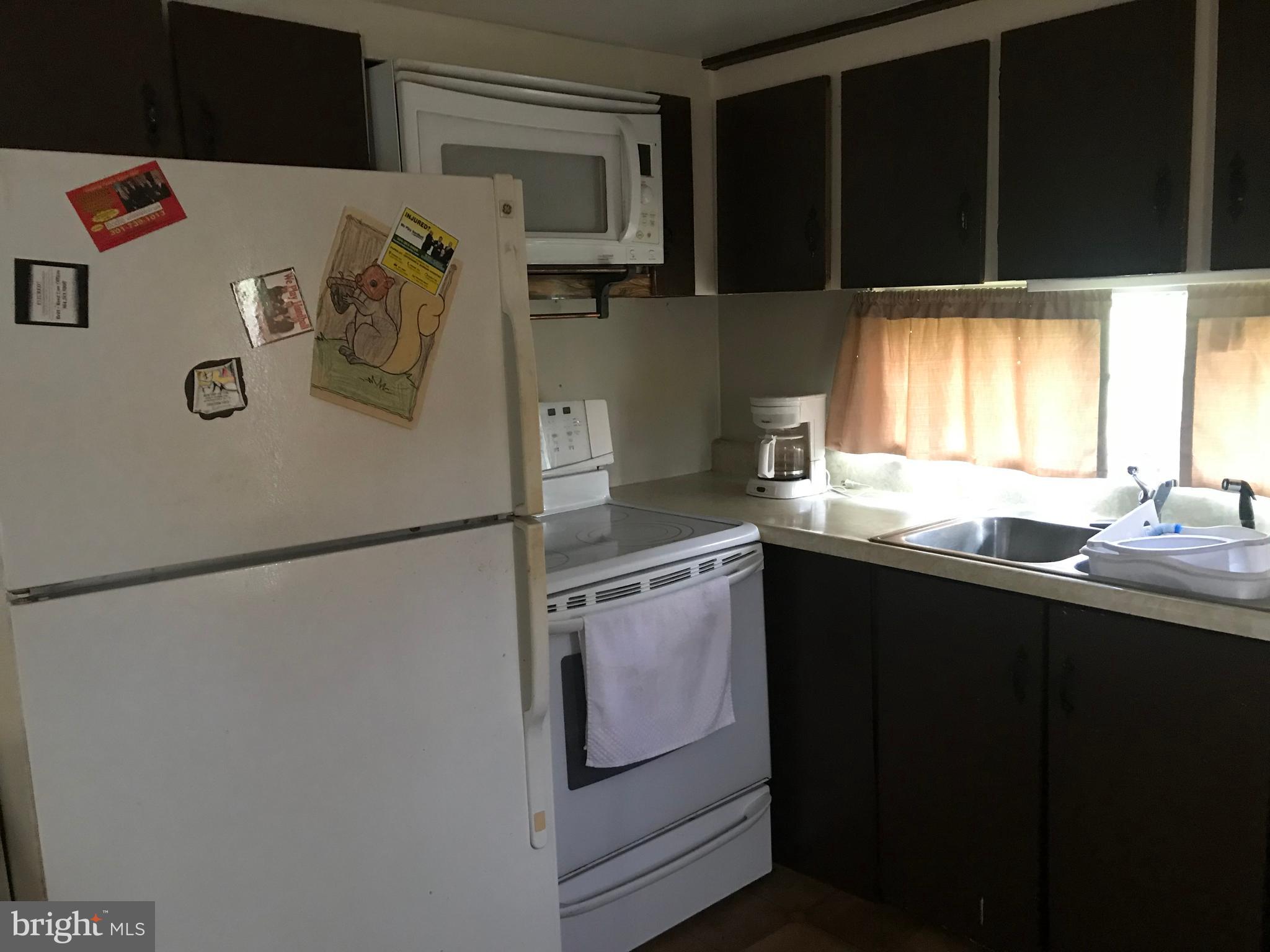 5670 Cold Run Valley Road Berkeley Springs, WV 25411 - Photo 20 of 26 Built in Microwave - Electric smooth top Range