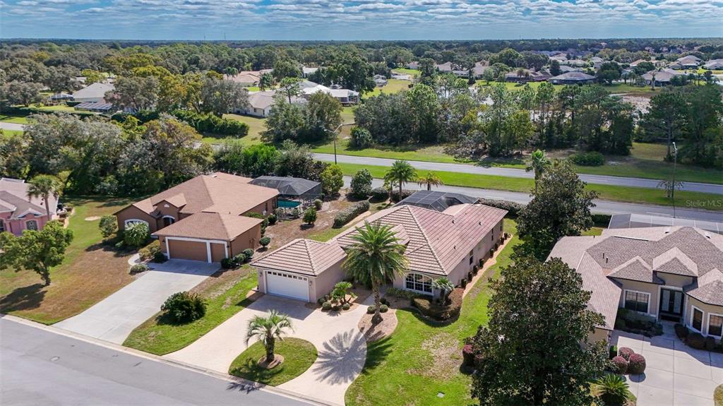 8426 Charleston Drive Weeki Wachee, FL 34613 - Photo 49 of 73 an aerial view of a house with a big yard