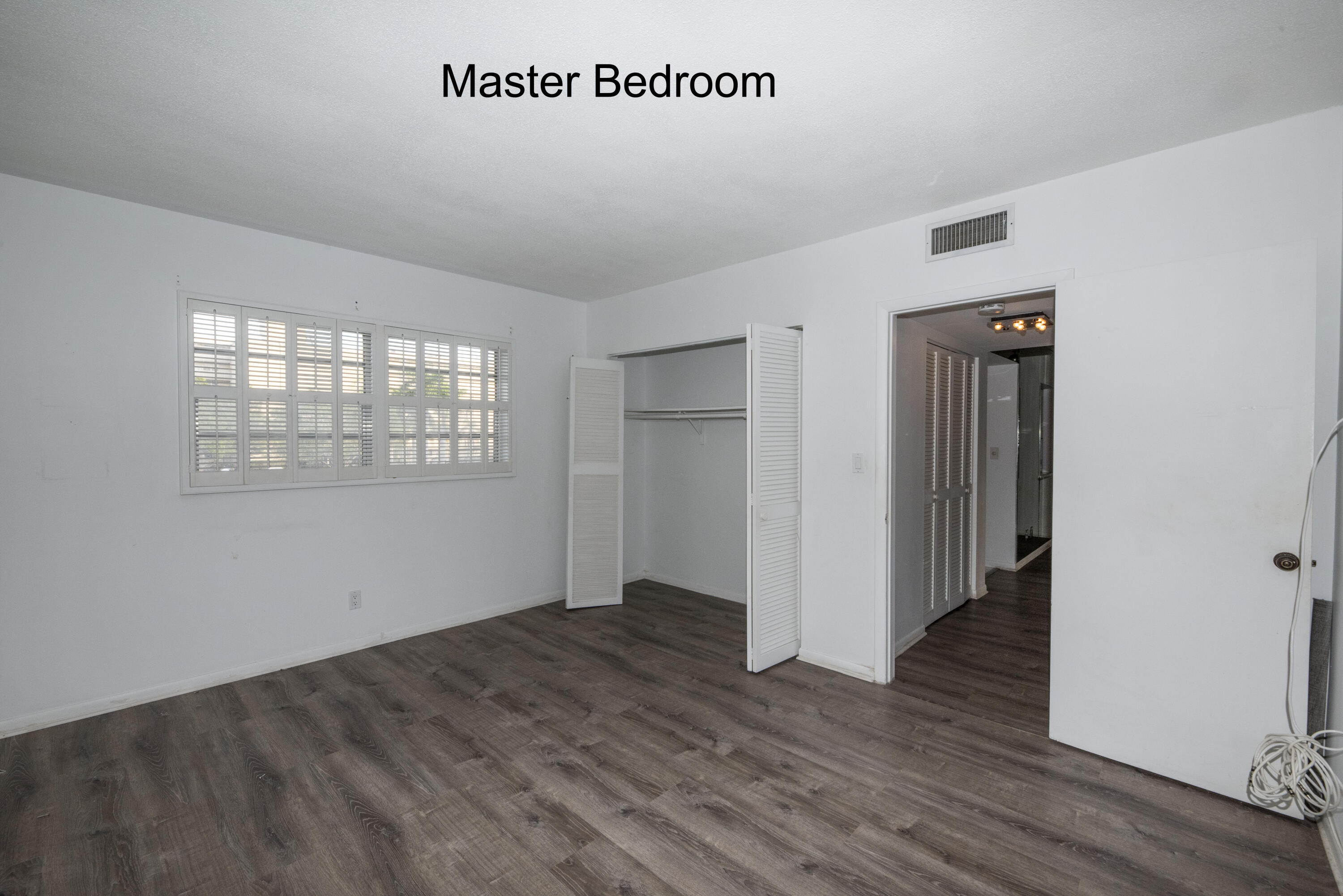 5501 Northwest 2nd Avenue, Unit 202 Boca Raton, FL 33487 - Photo 3 of 11 masterbed