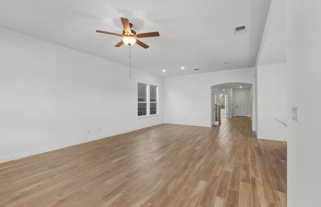 a view of kitchen with furniture and wooden floor