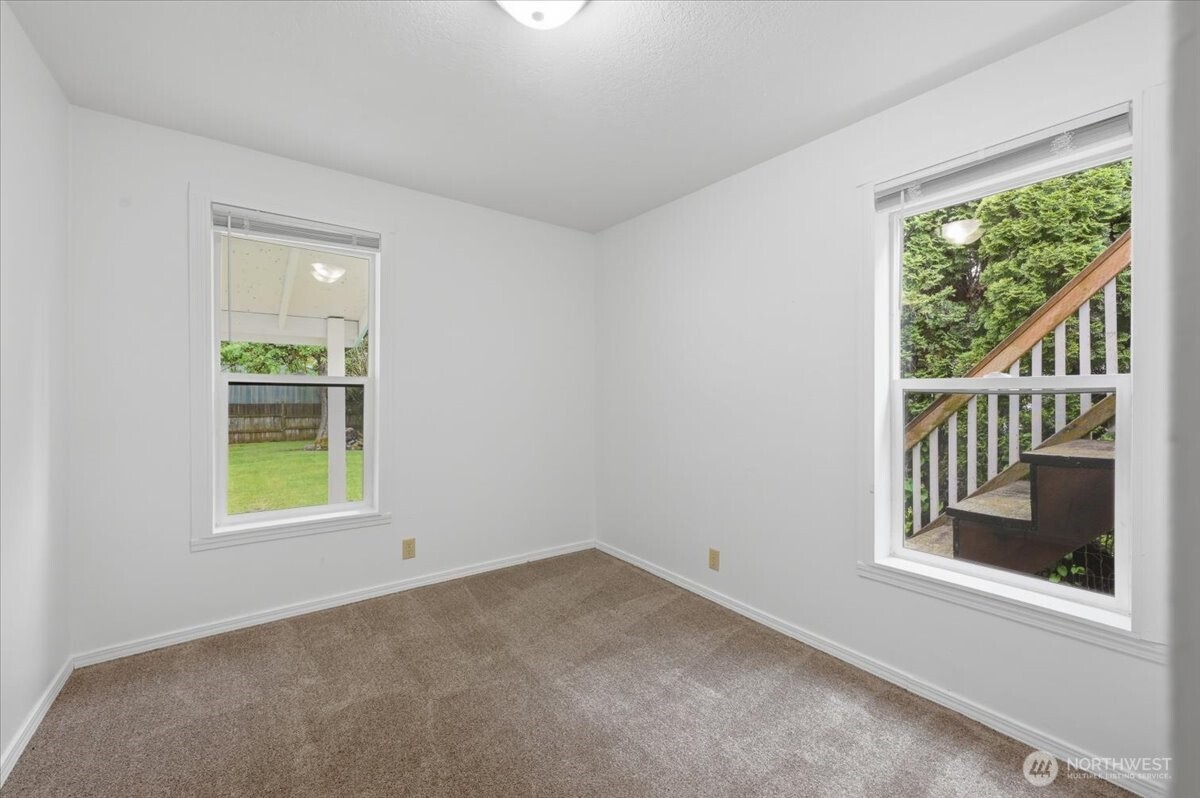 23746 Old Day Creek Road, Unit A & B Sedro-Woolley, WA 98284 - Photo 16 of 36 an empty room with windows