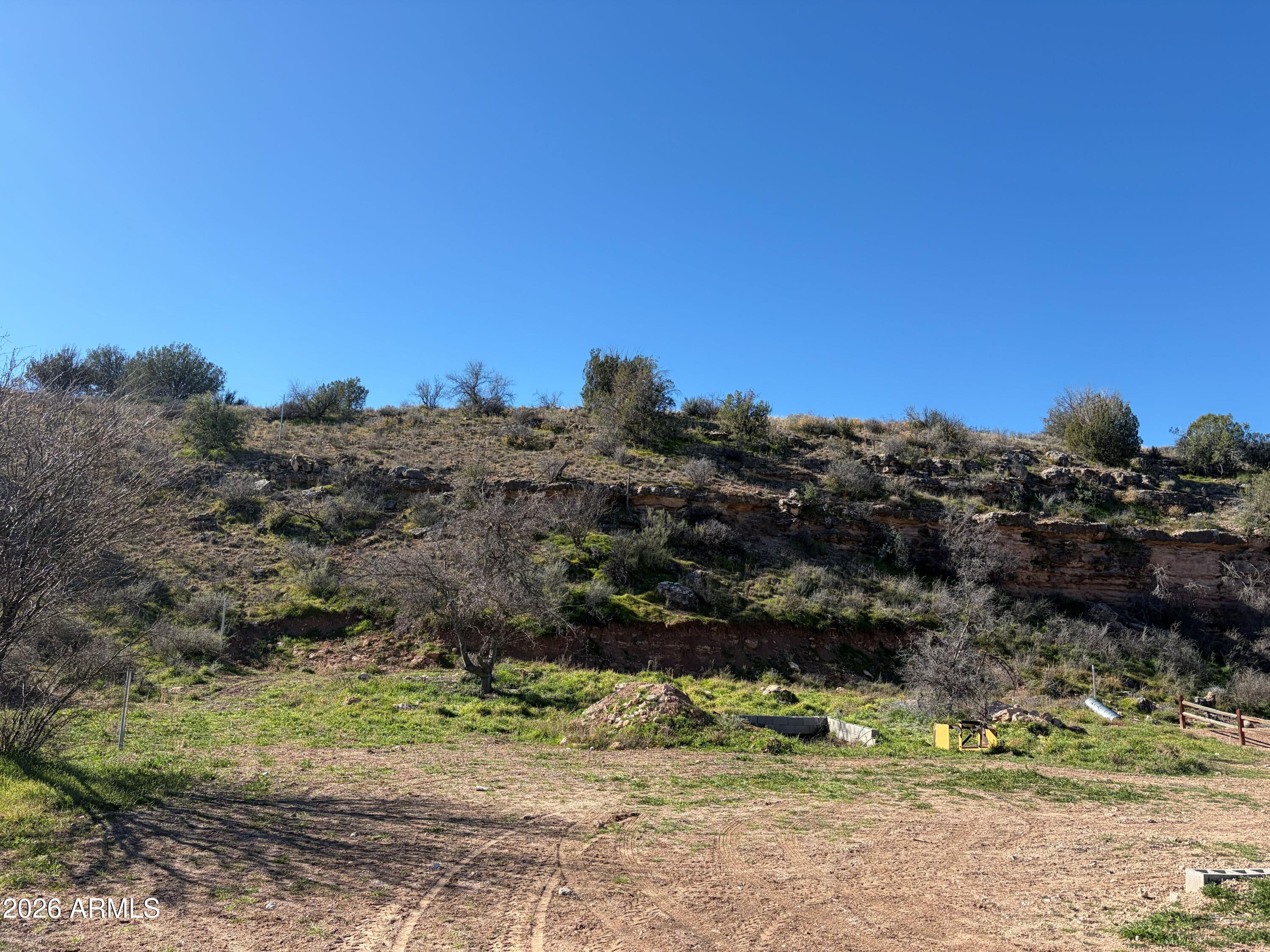 3545 East Montezuma Avenue, Unit 74 Rimrock, AZ 86335 - Photo 2 of 11 a view of a yard with a tree