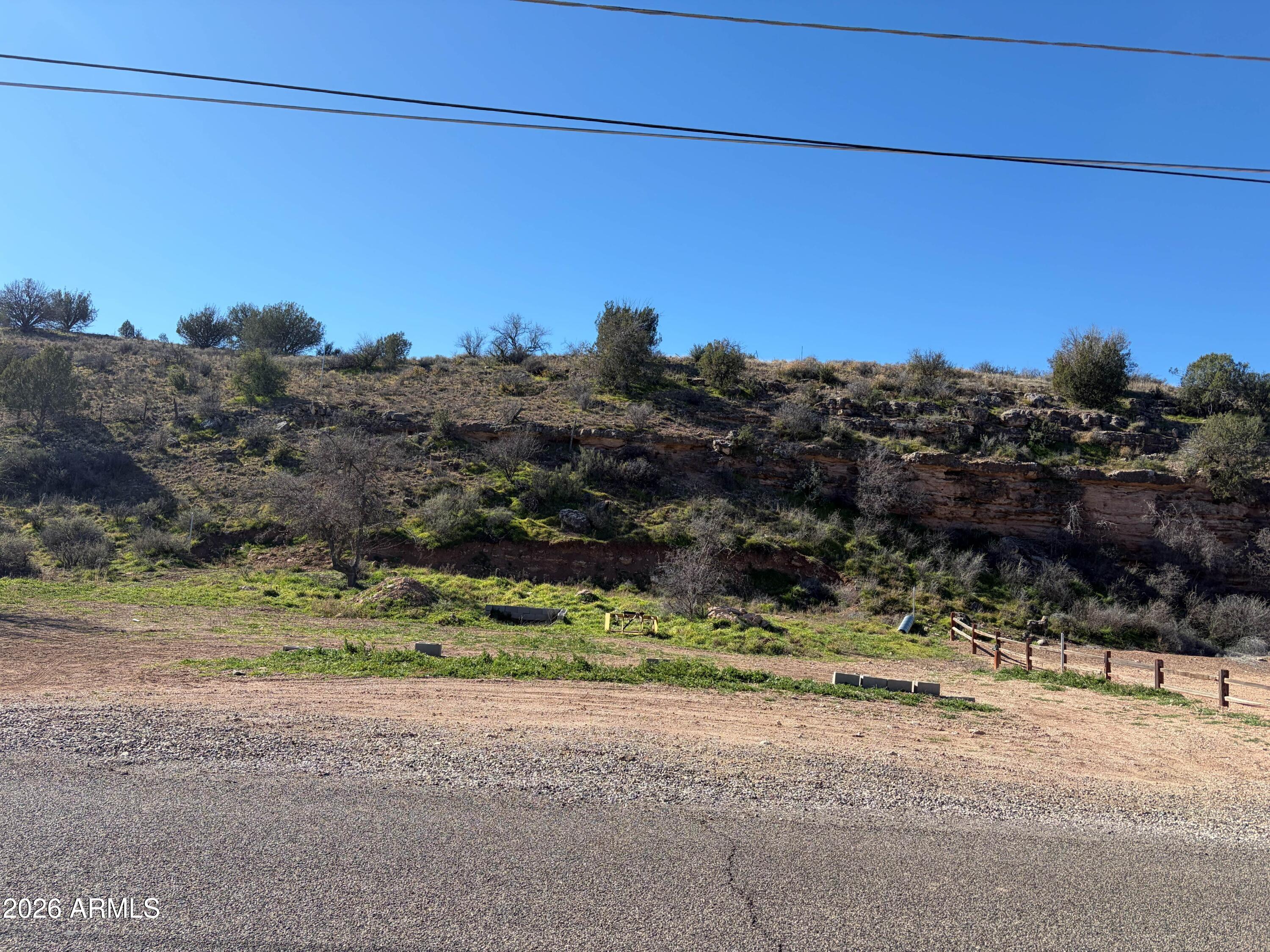 3545 East Montezuma Avenue, Unit 74 Rimrock, AZ 86335 - Photo 3 of 11 a view of a road with a building in the background
