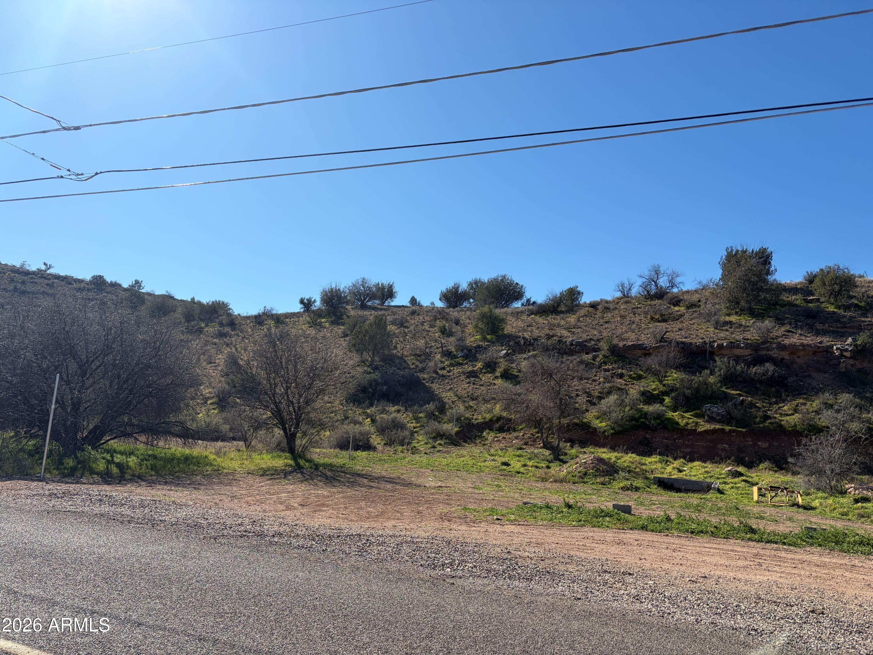 3545 East Montezuma Avenue, Unit 74 Rimrock, AZ 86335 - Photo 5 of 11 a view of a road with a building in the background