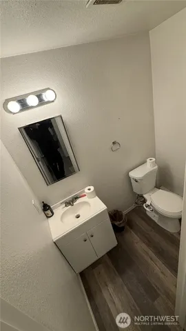 a bathroom with a sink and a toilet
