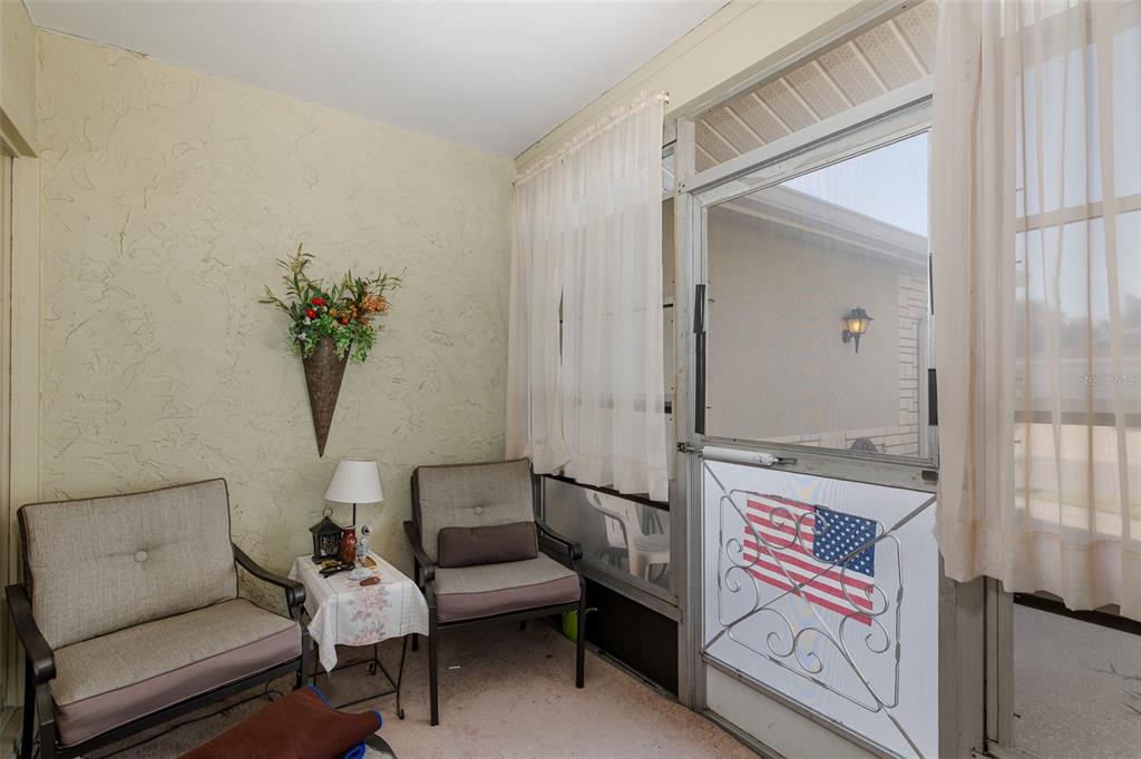 8015 San Fernando Drive Port Richey, FL 34668 - Photo 27 of 46 a living room with furniture