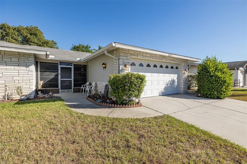 8015 San Fernando Drive Port Richey, FL 34668 - Photo 39 of 46 a view of a house with backyard