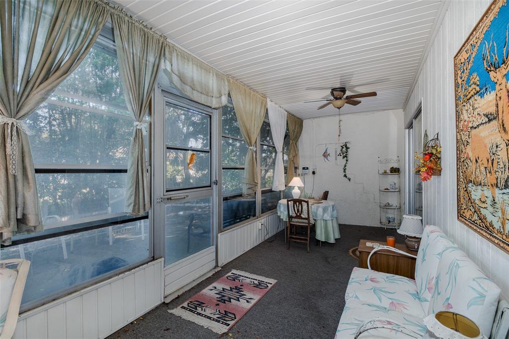 8015 San Fernando Drive Port Richey, FL 34668 - Photo 40 of 46 a living room with furniture and a window