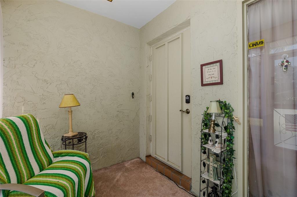 8015 San Fernando Drive Port Richey, FL 34668 - Photo 8 of 46 a bedroom with a bed and a window