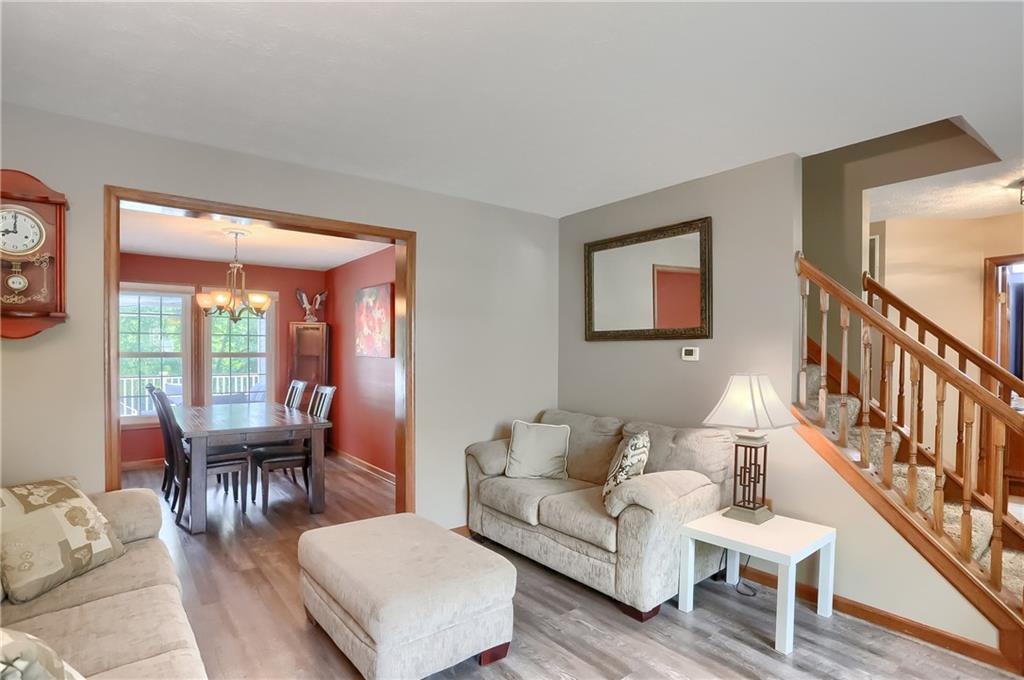 105 Blue Ridge Drive Cranberry Township, PA 16066 - Photo 5 of 50 a living room with furniture and a wooden floor