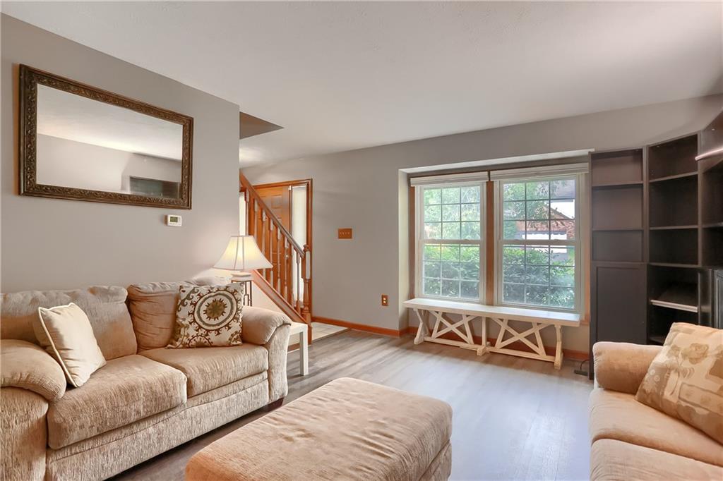 105 Blue Ridge Drive Cranberry Township, PA 16066 - Photo 6 of 50 a living room with furniture and a large window