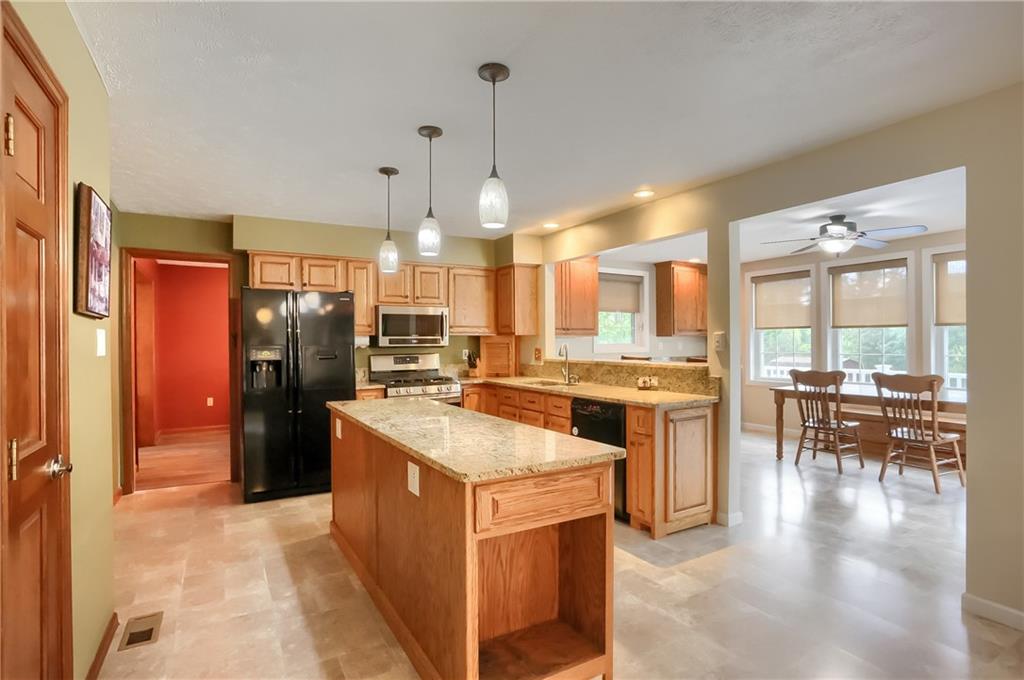 105 Blue Ridge Drive Cranberry Township, PA 16066 - Photo 8 of 50 a kitchen that has a lot of cabinets a sink and appliances in it