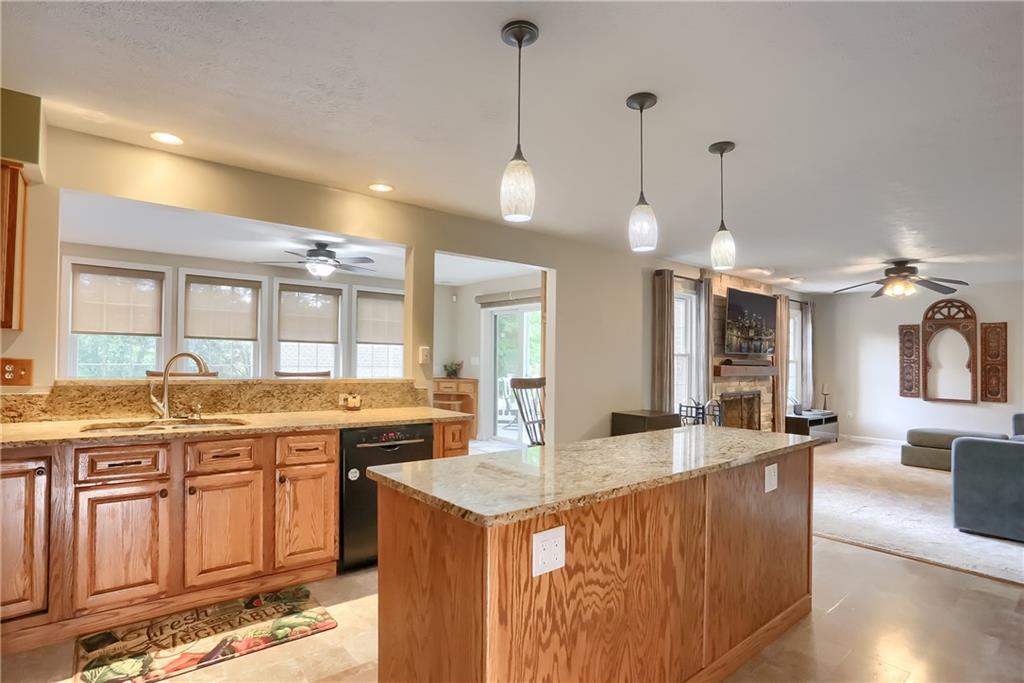 105 Blue Ridge Drive Cranberry Township, PA 16066 - Photo 10 of 50 a large kitchen with kitchen island a stove a sink a center island and furniture
