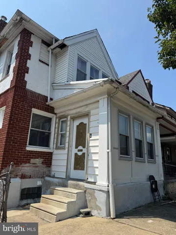 a view of a building with a window and balcony