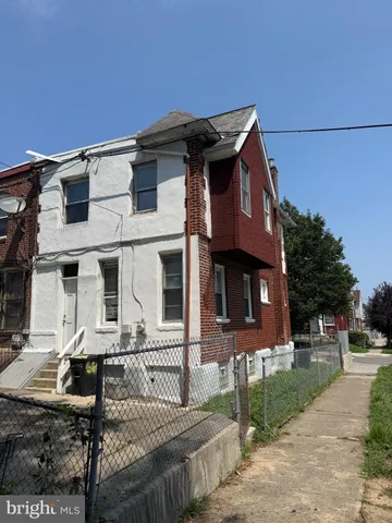 a front view of a house with garage