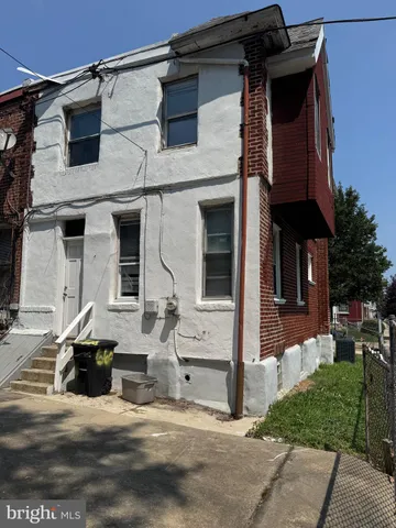 a view of a house with a sink and glass door
