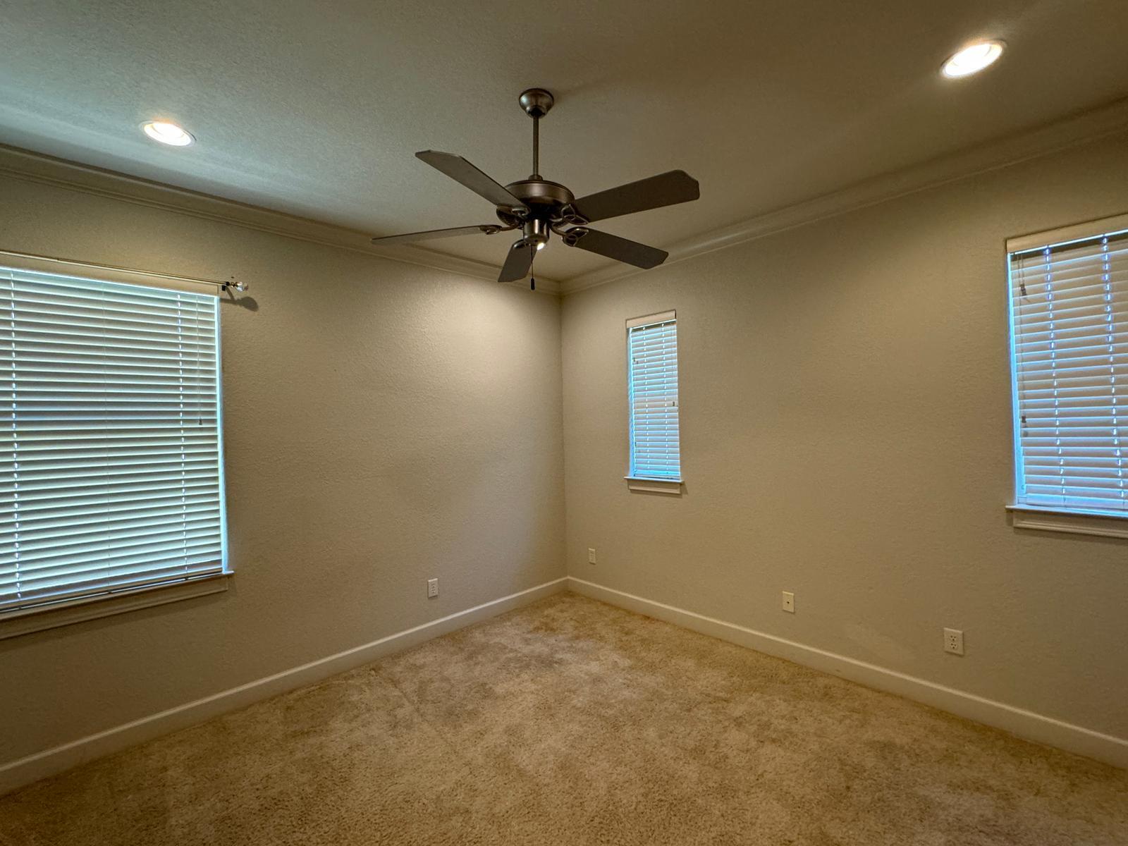 241 Inverrary Drive Destin, FL 32541 - Photo 15 of 24 a view of a livingroom with a ceiling fan and window