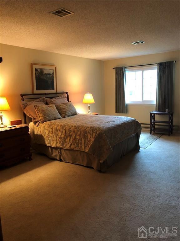 564 B Ardmore Road Monroe Township, NJ 08831 - Photo 15 of 26 a bedroom with a bed and window
