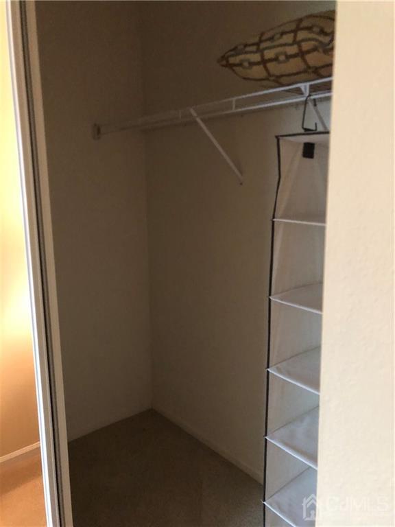 564 B Ardmore Road Monroe Township, NJ 08831 - Photo 22 of 26 a view of a rack
