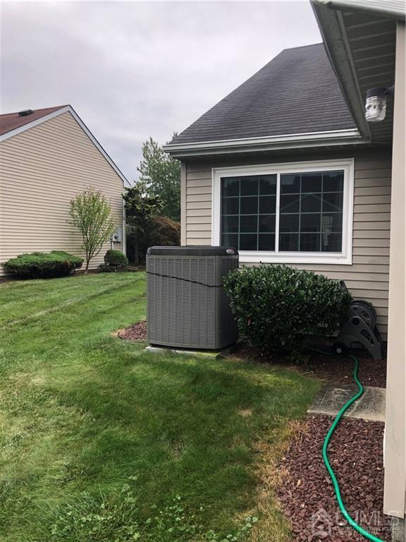 564 B Ardmore Road Monroe Township, NJ 08831 - Photo 25 of 26 a house view with a garden space