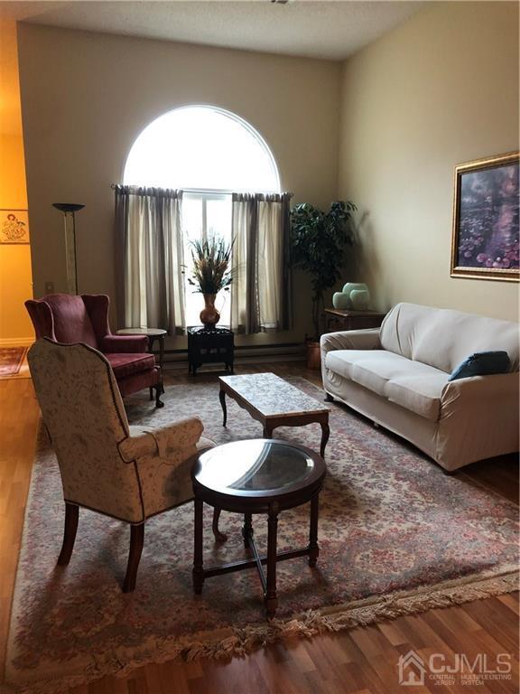 564 B Ardmore Road Monroe Township, NJ 08831 - Photo 4 of 26 a living room with furniture and a large window