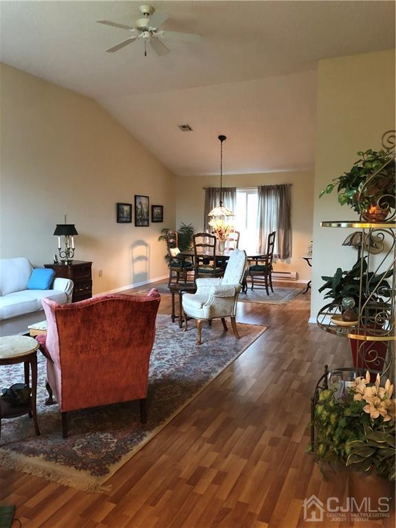 564 B Ardmore Road Monroe Township, NJ 08831 - Photo 5 of 26 a living room with furniture and a chandelier