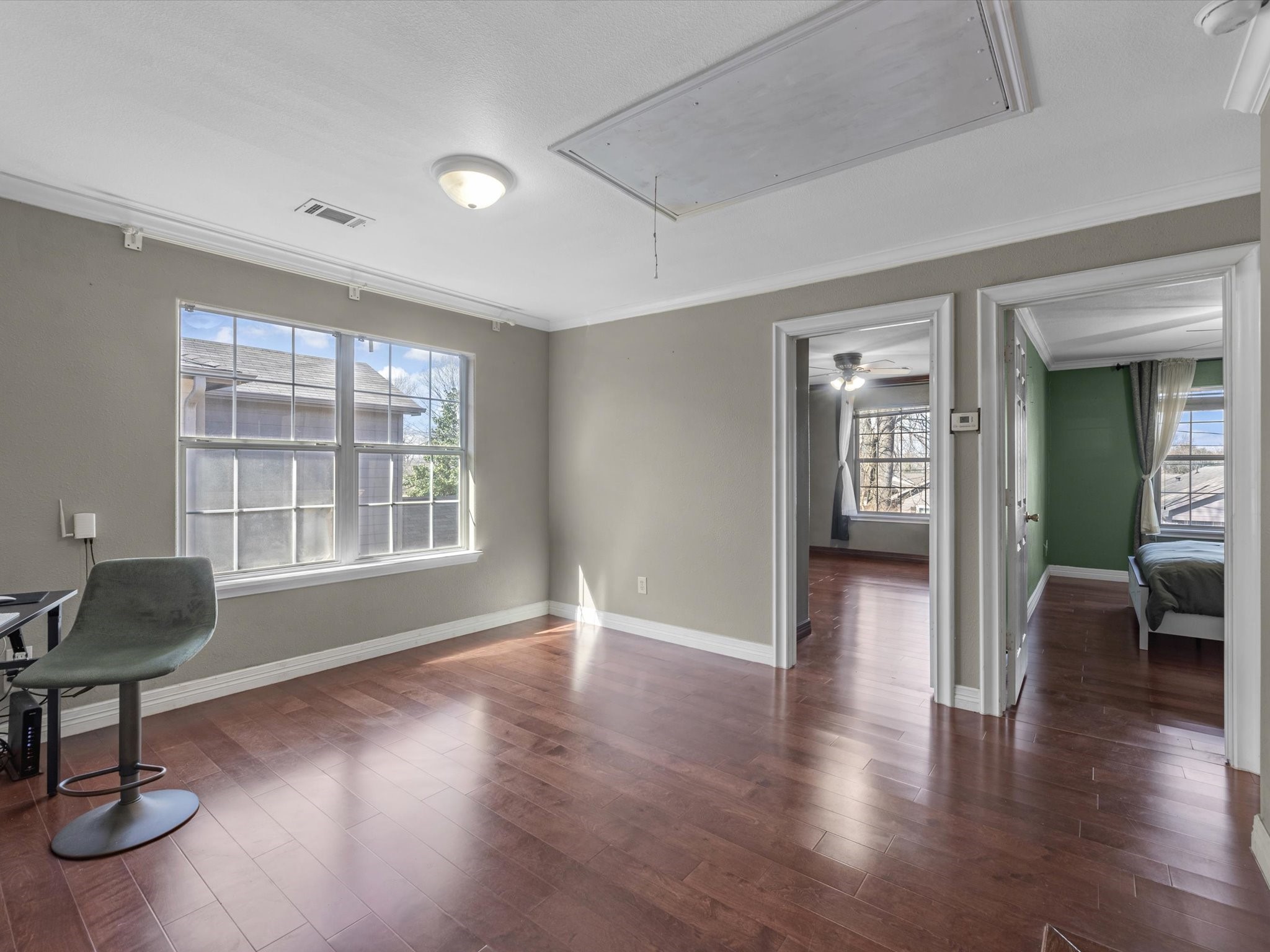 8906 Intervale Street Houston, TX 77075 - Photo 15 of 21 a view of livingroom with hardwood floor and workspace