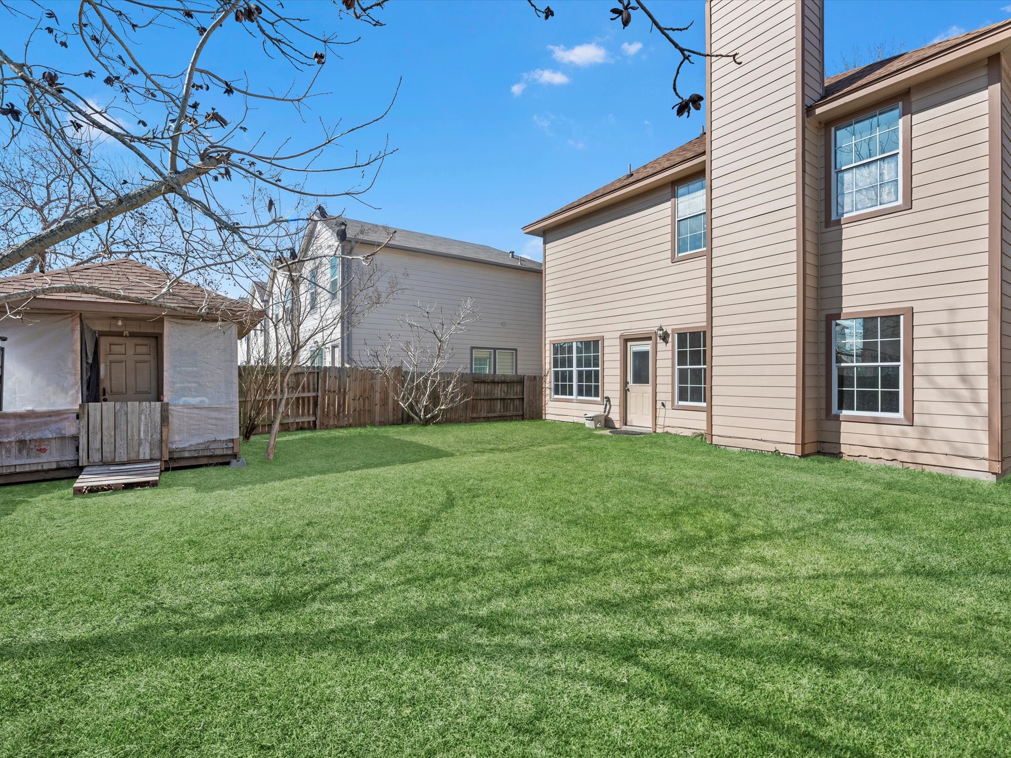 8906 Intervale Street Houston, TX 77075 - Photo 18 of 21 a view of a house with backyard and porch