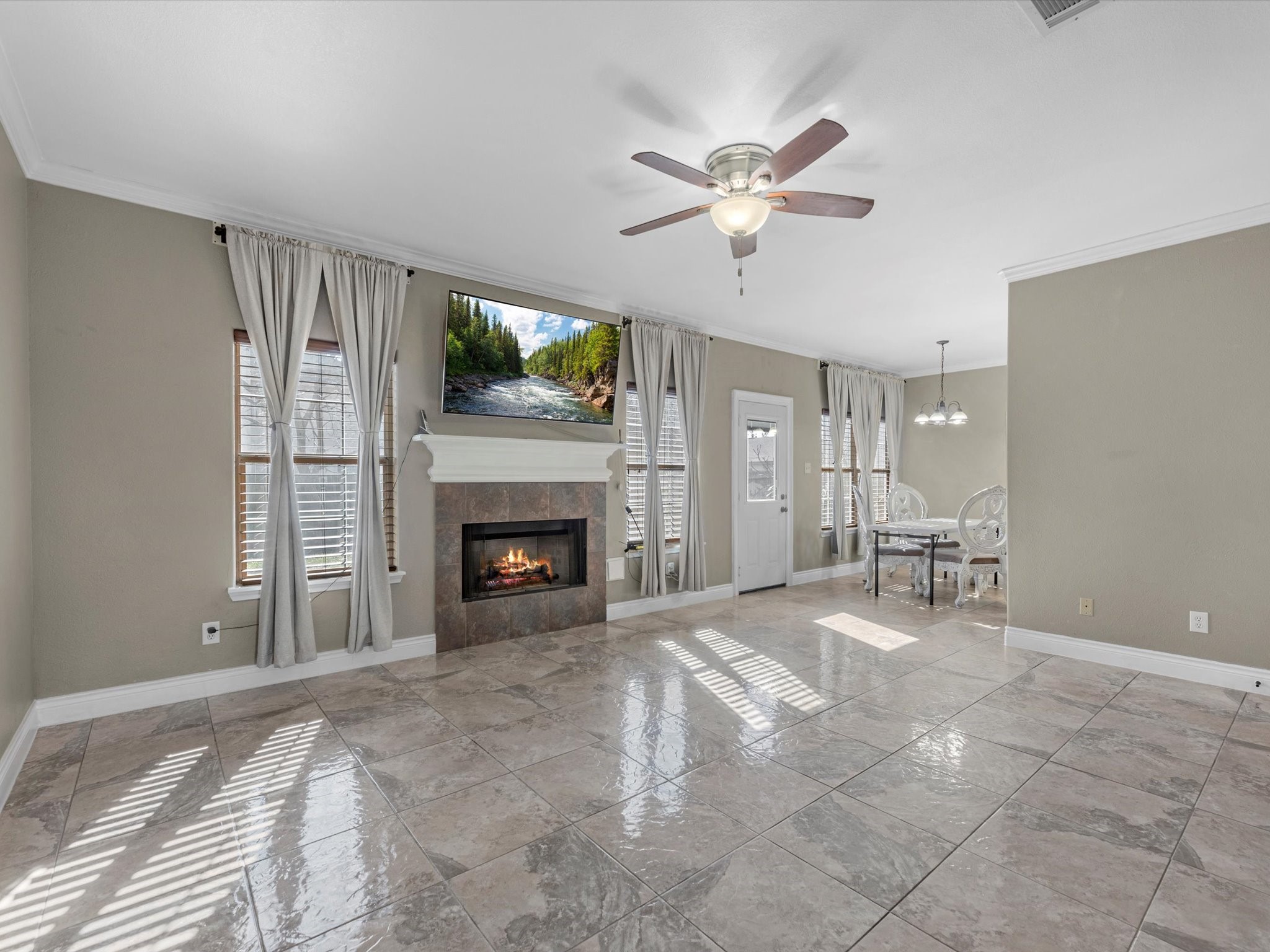 8906 Intervale Street Houston, TX 77075 - Photo 3 of 21 a view of a livingroom with a fireplace and window