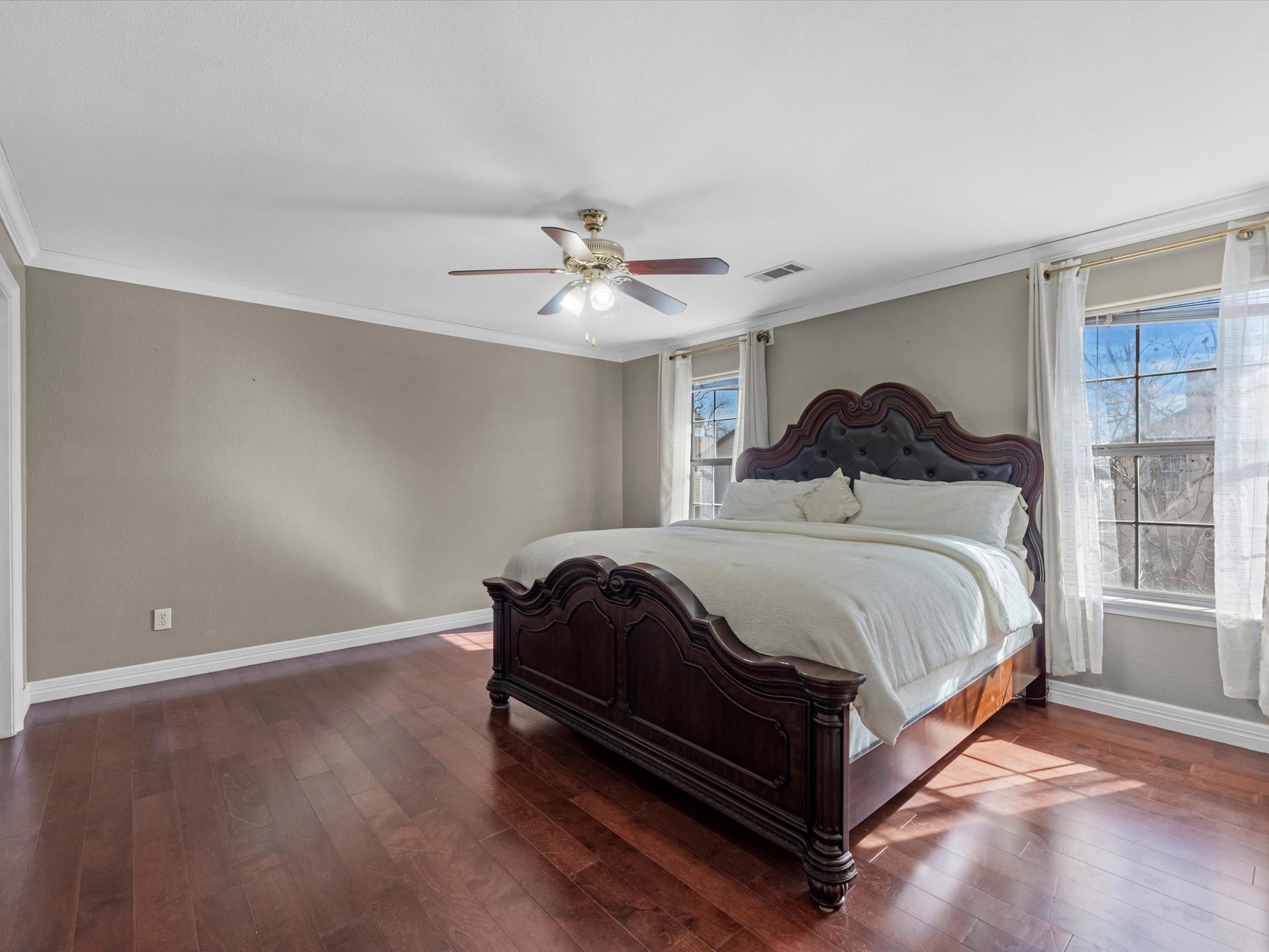 8906 Intervale Street Houston, TX 77075 - Photo 8 of 21 a bedroom with a bed and window
