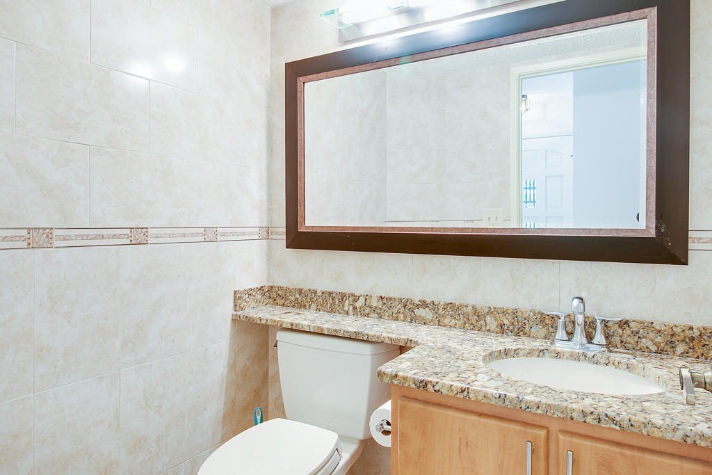 7877 La Mirada Drive, Unit 7877 Boca Raton, FL 33433 - Photo 9 of 20 Bathroom downstairs