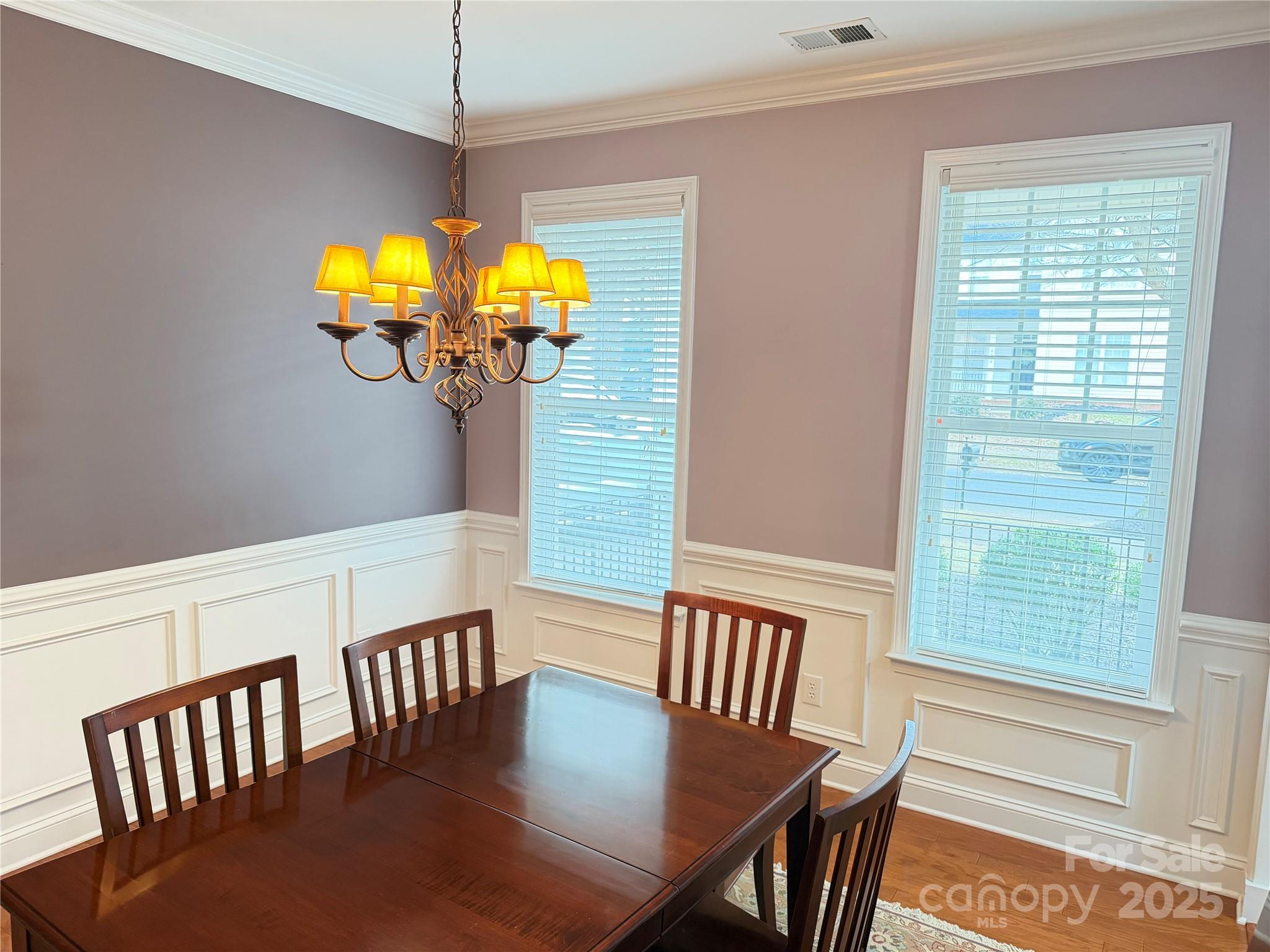 10219 Caldwell Depot Road Cornelius, NC 28031 - Photo 23 of 42 a view of a dining room with furniture and a window