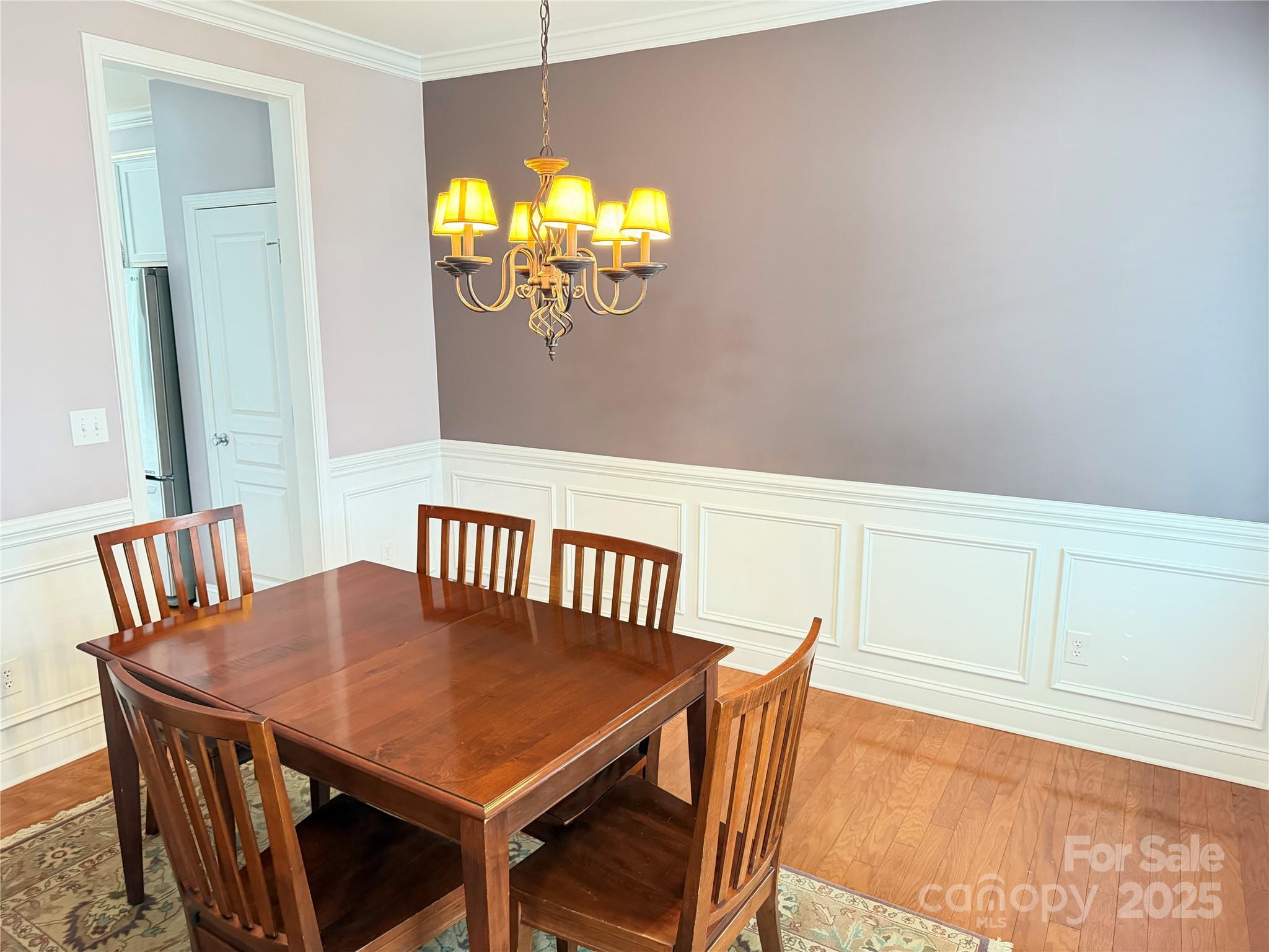 10219 Caldwell Depot Road Cornelius, NC 28031 - Photo 24 of 42 a view of a dining room with furniture