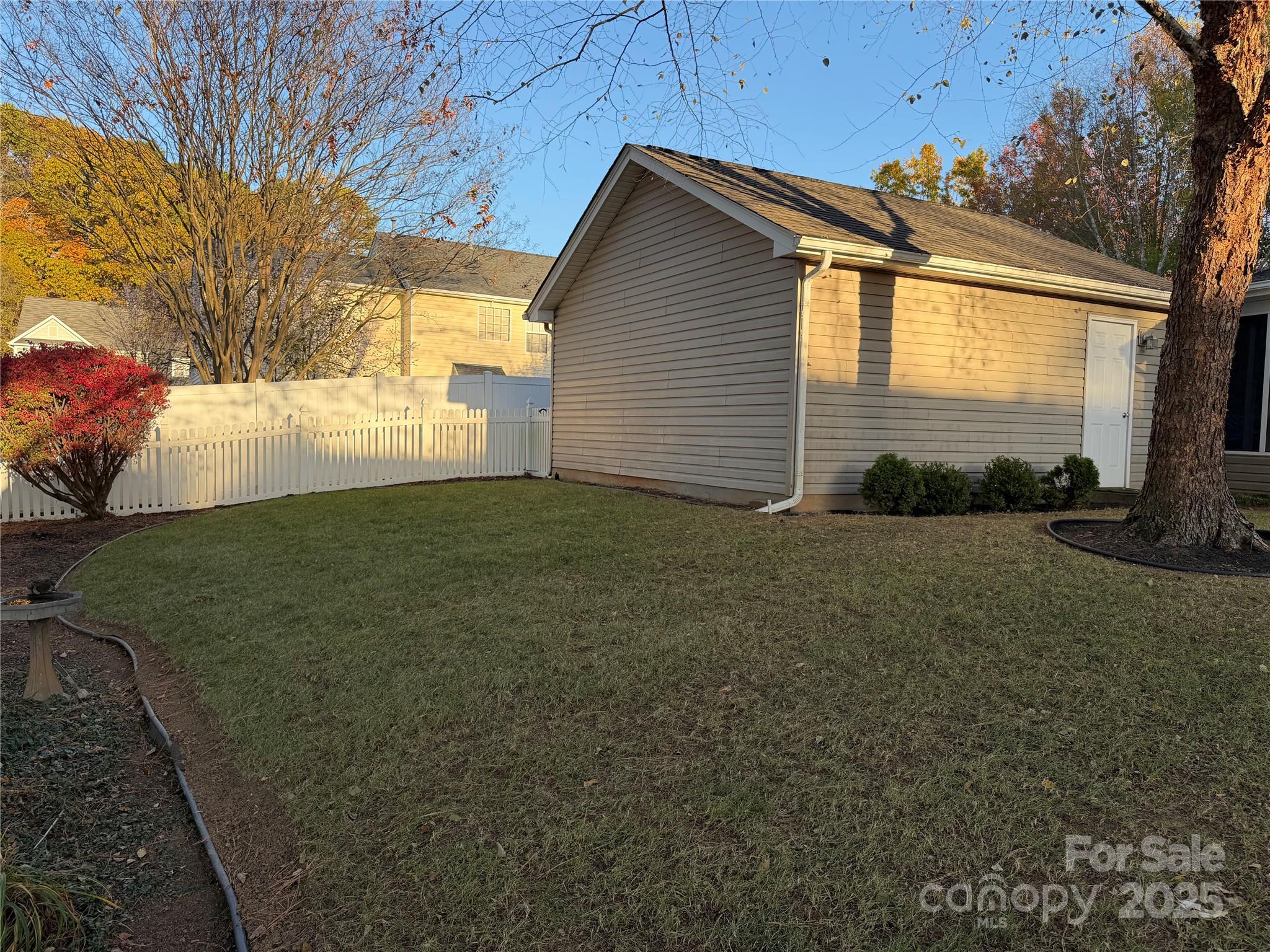 10219 Caldwell Depot Road Cornelius, NC 28031 - Photo 7 of 42 a view of a backyard of the house