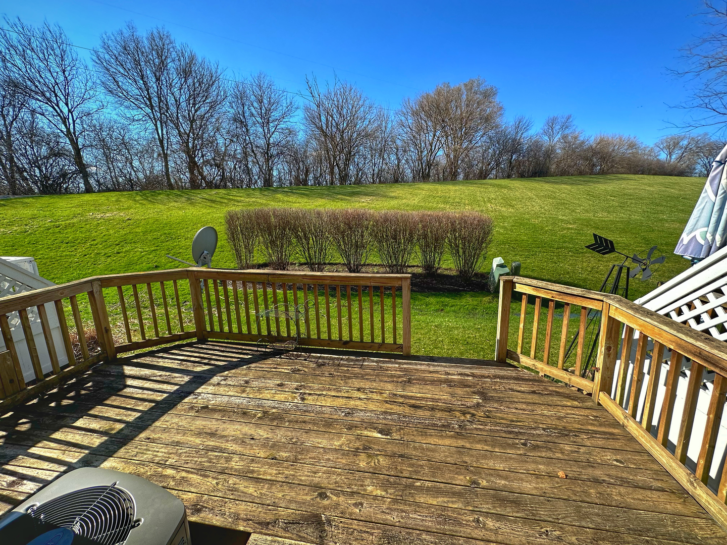306 Cane Garden Circle Aurora, IL 60504 - Photo 13 of 13 a view of a wooden deck with a yard