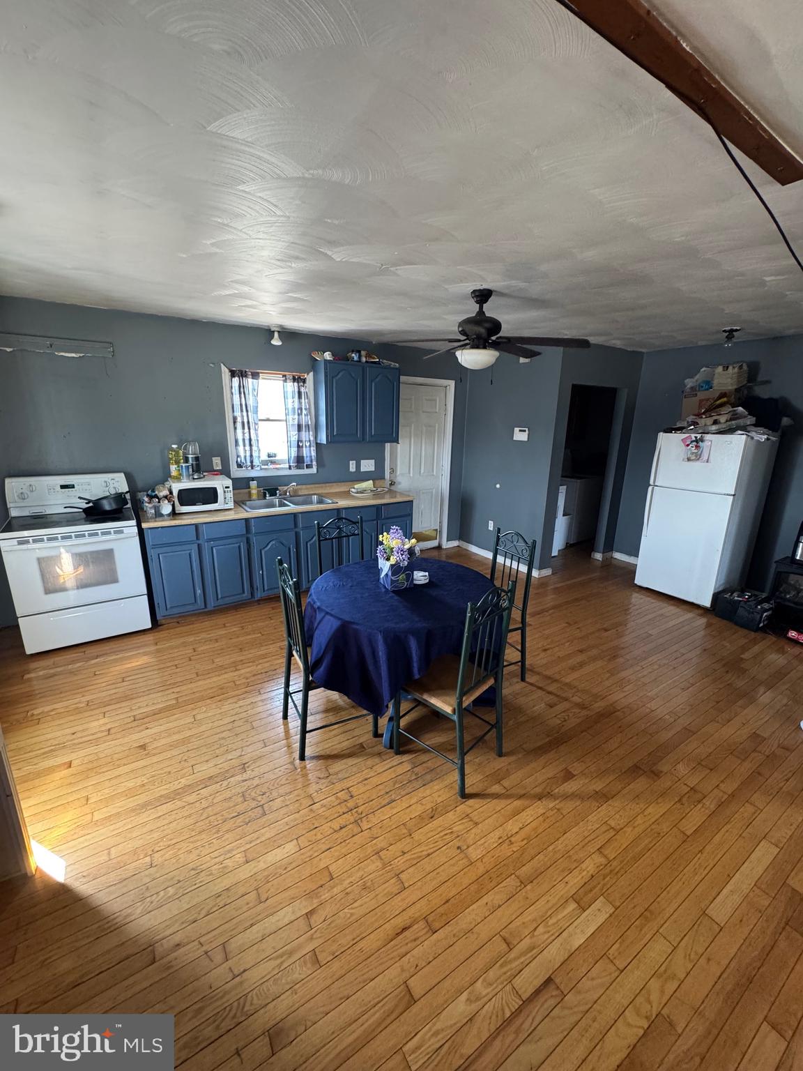878 Hatchery Road Inwood, WV 25428 - Photo 115 of 131 a view of a dining room with furniture and chandelier