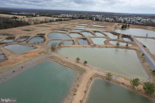 a view of a living room and kitchen
