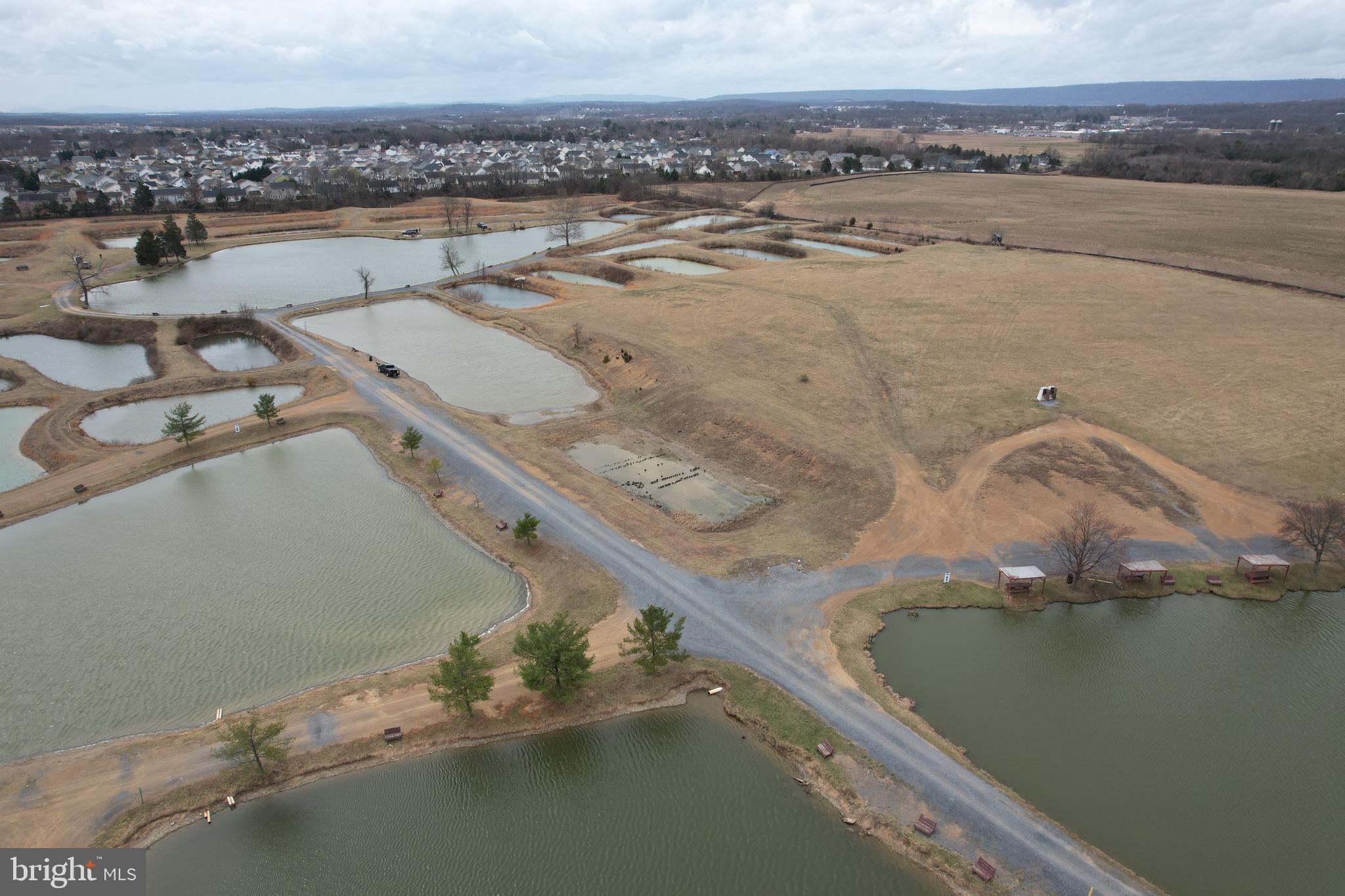 878 Hatchery Road Inwood, WV 25428 - Photo 21 of 131 a view of a lake view