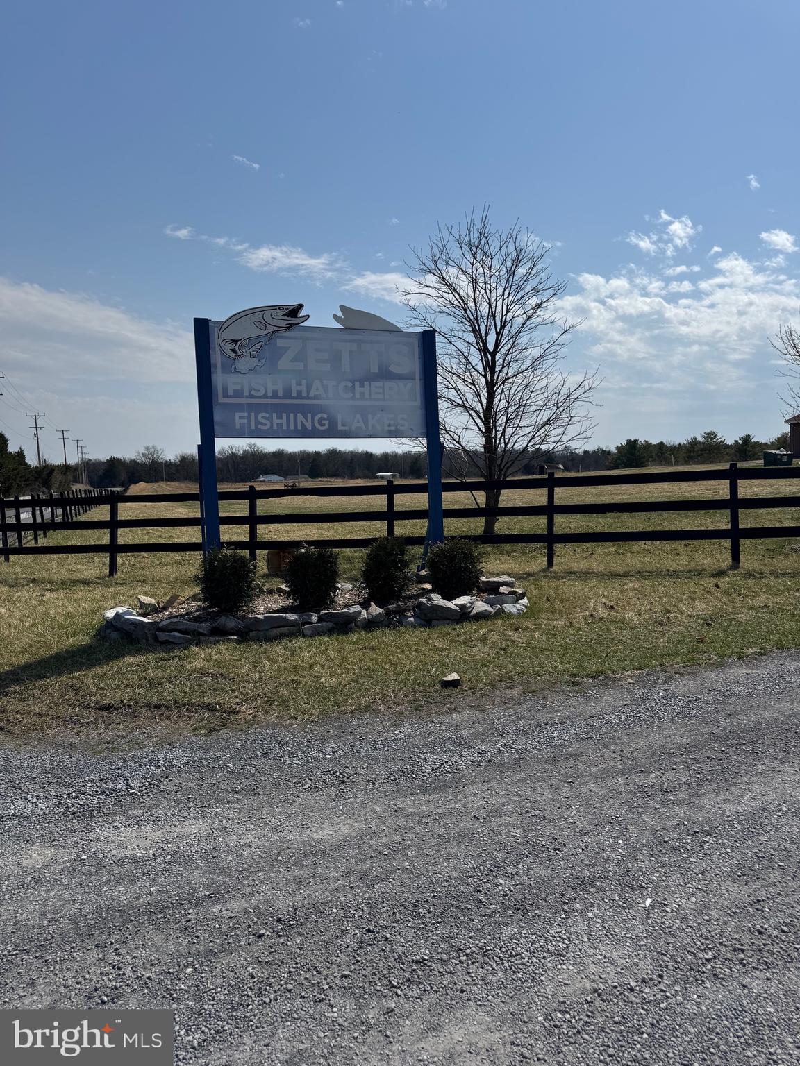 878 Hatchery Road Inwood, WV 25428 - Photo 35 of 131 a view of a yard with wooden fence