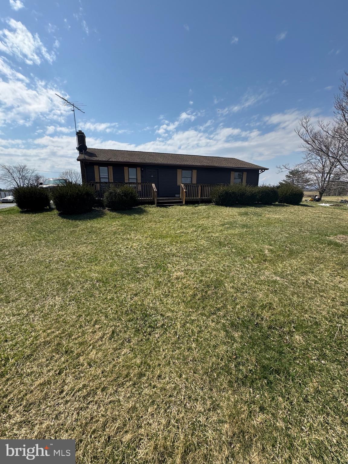 878 Hatchery Road Inwood, WV 25428 - Photo 6 of 131 a view of a house with a yard
