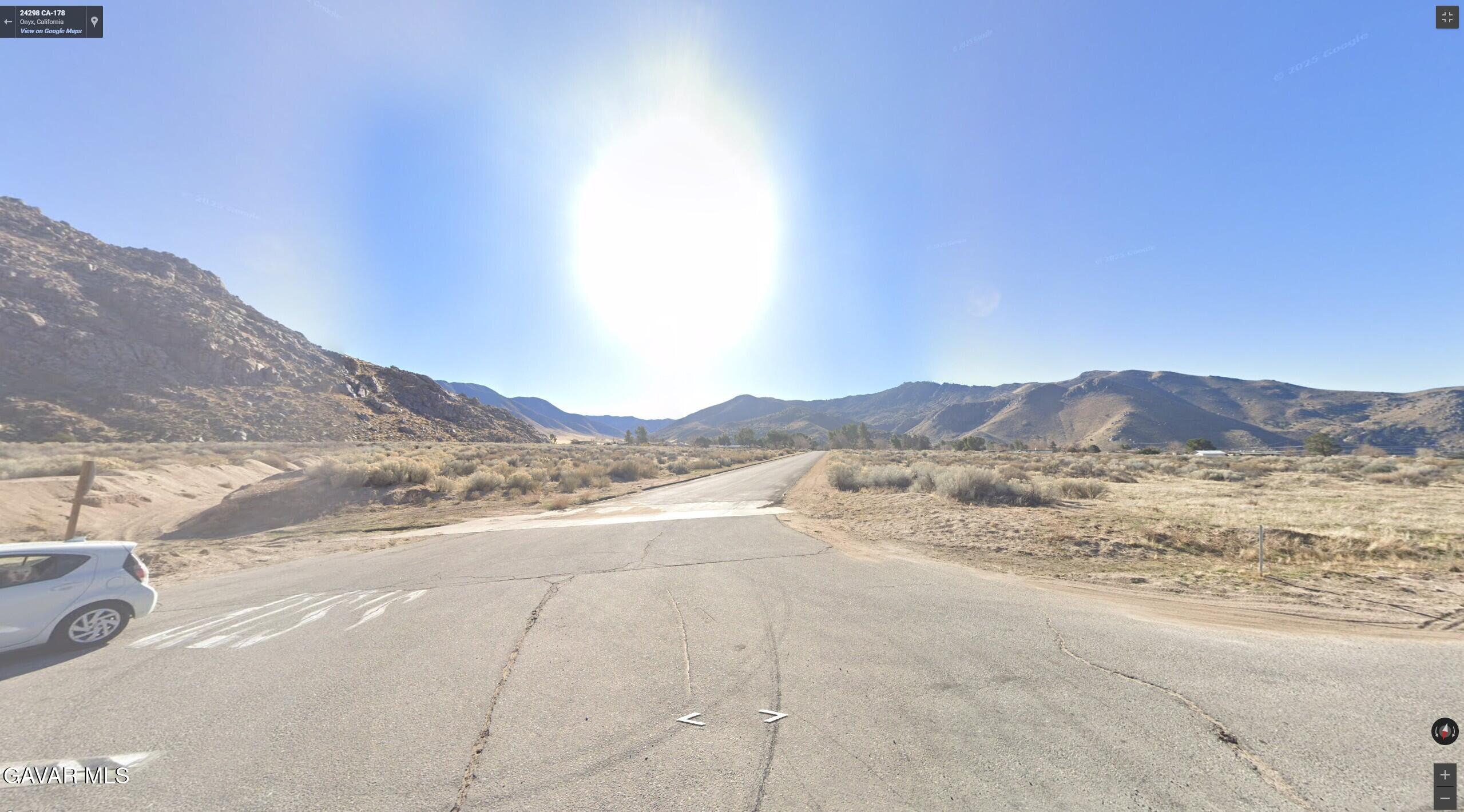 Jill Street Onyx, CA 93255 - Photo 2 of 5 a view of an ocean with a mountain