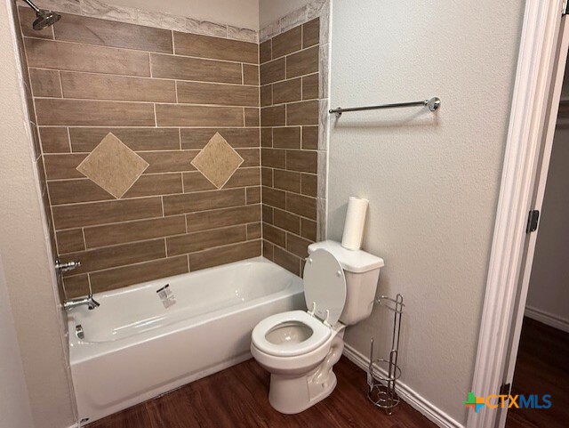 2410 Westcliff Road, Unit A Killeen, TX 76543 - Photo 10 of 22 a bathroom with a toilet and a bath tub