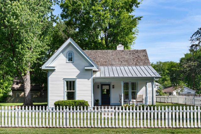 a front view of house with yard