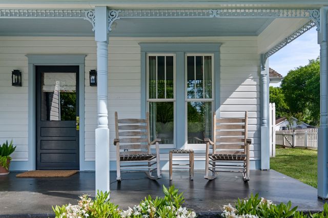 a view of with two chairs in the patio