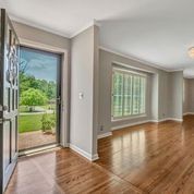 307 Raintree Drive Hendersonville, TN 37075 - Photo 2 of 42 a view of an empty room with wooden floor and a window