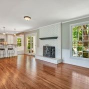 307 Raintree Drive Hendersonville, TN 37075 - Photo 13 of 42 a view of an empty room with wooden floor and a window