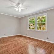 307 Raintree Drive Hendersonville, TN 37075 - Photo 17 of 42 wooden floor in an empty room with a window